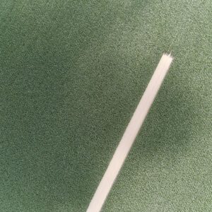 Abstrakte Luftaufnahme von einem Maisfeld mit einer Ernte - Spur, Symmetrie der Natur vertikal aus 99 Metern Höhe fotografiert, Fine Art, 99 Meter Print von Thorsten Springer